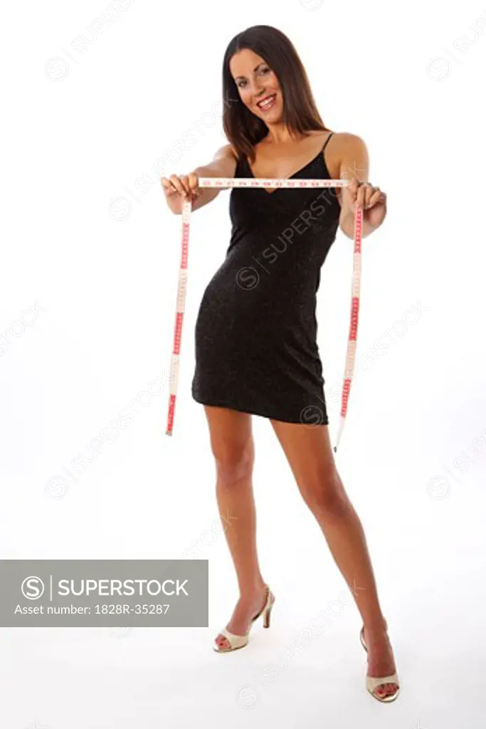 Woman Holding Tape Measure   
