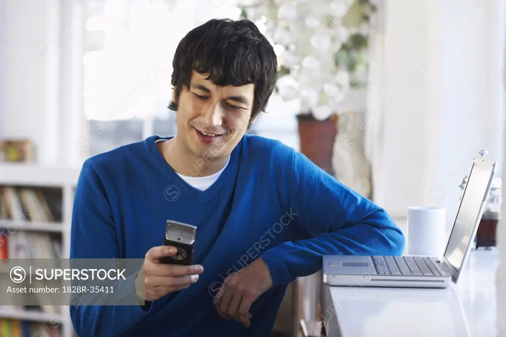 Man Reading Text Message   