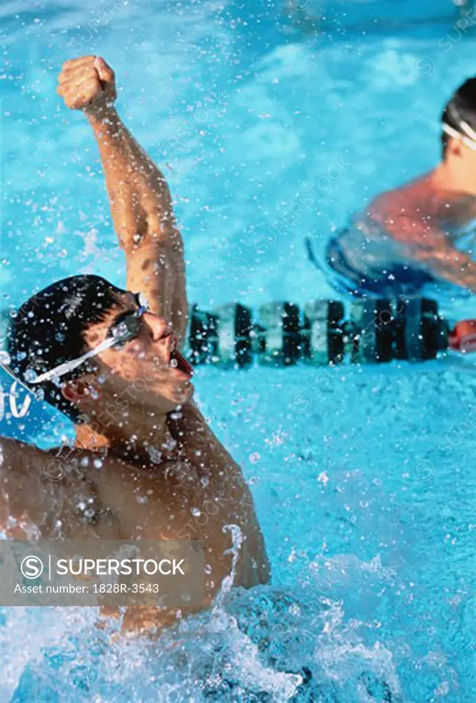 Man Winning Swimming Competition   