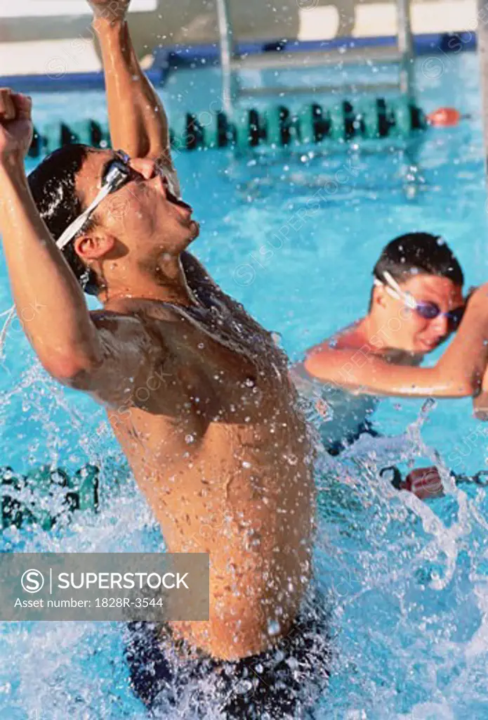 Man Winning Swimming Competition   