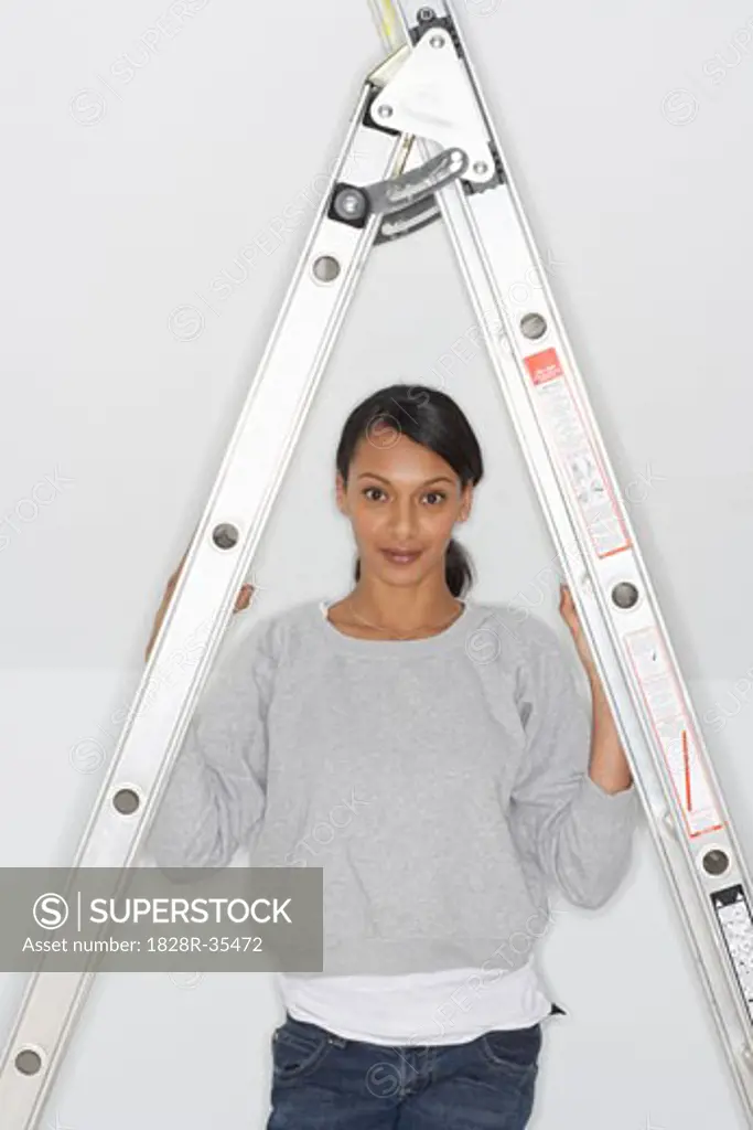 Woman Standing by Ladder   