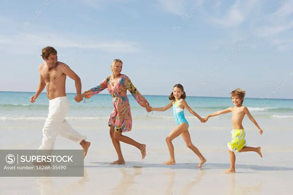 Family Running on Beach, Malorca, Spain, Marjorca, Spain   