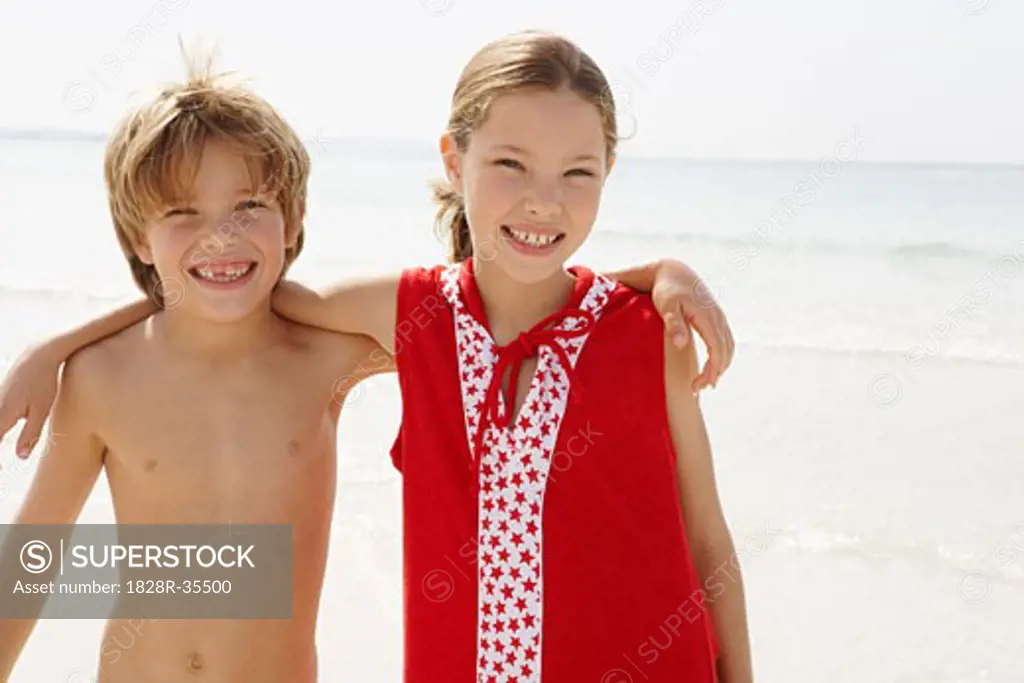 Portrait of Brother and Sister on Beach, Majorca, Spain   