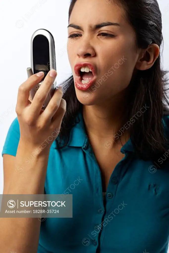 Angry Woman Yelling into Cell Phone   