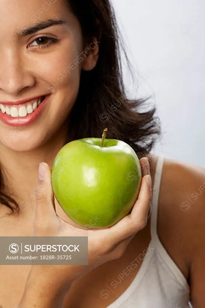 Portrait of Woman Holding Apple   