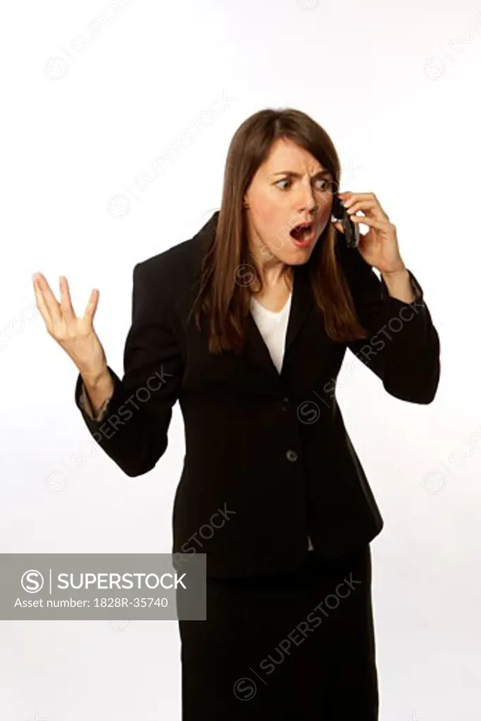 Angry Businesswoman on Cell Phone   