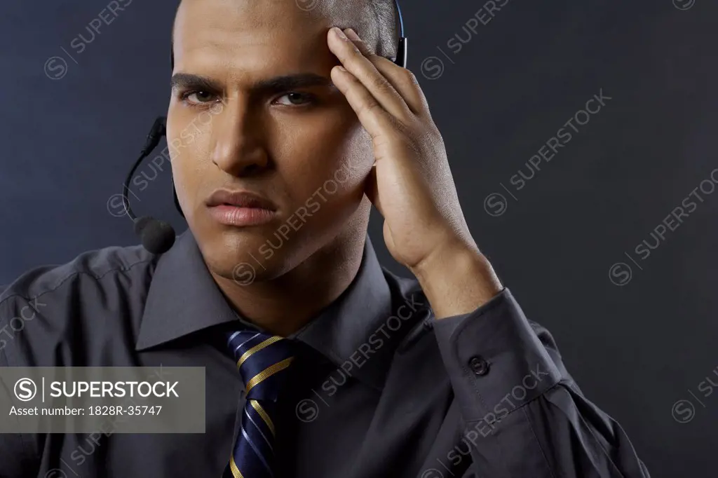 Businessman Wearing Headset  