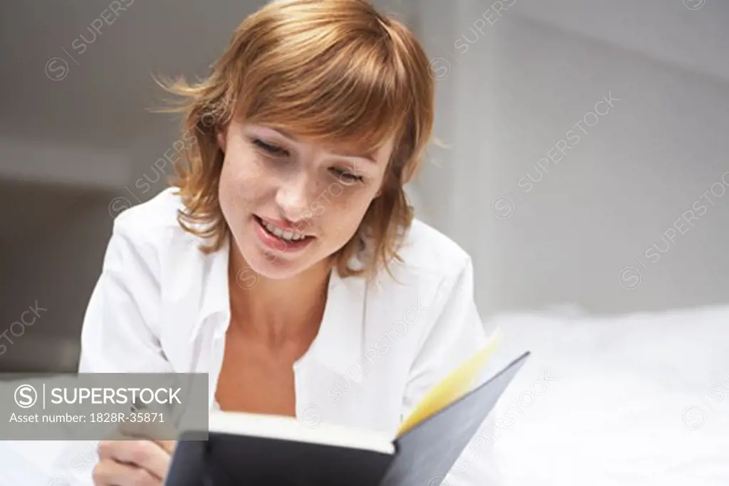 Woman Writing in Journal   