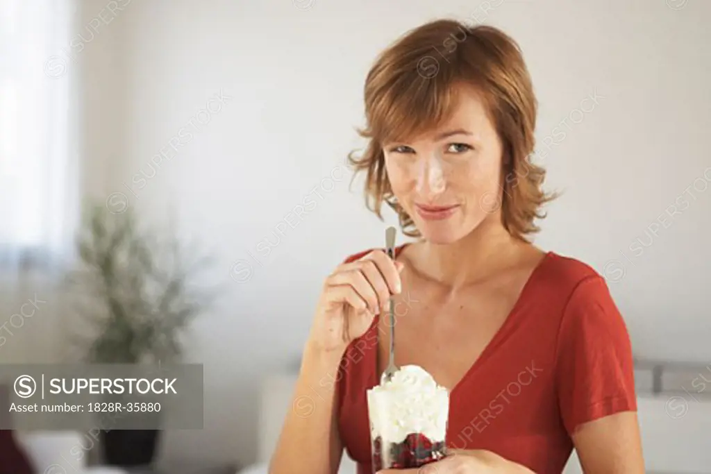 Woman Eating Sundae   