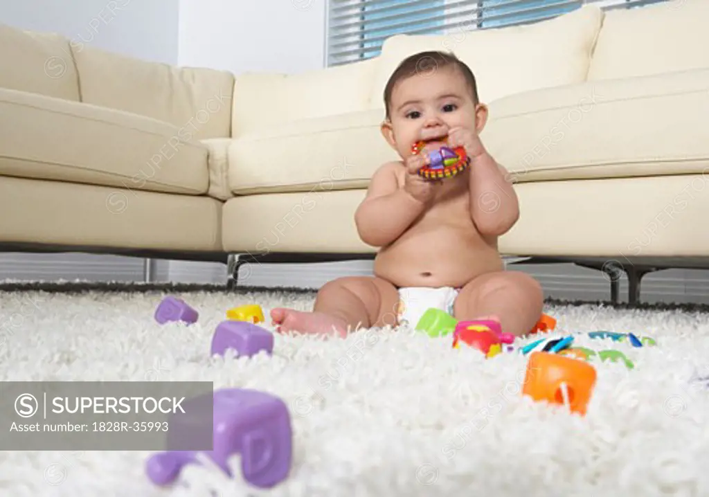 Baby Playing With Toys   