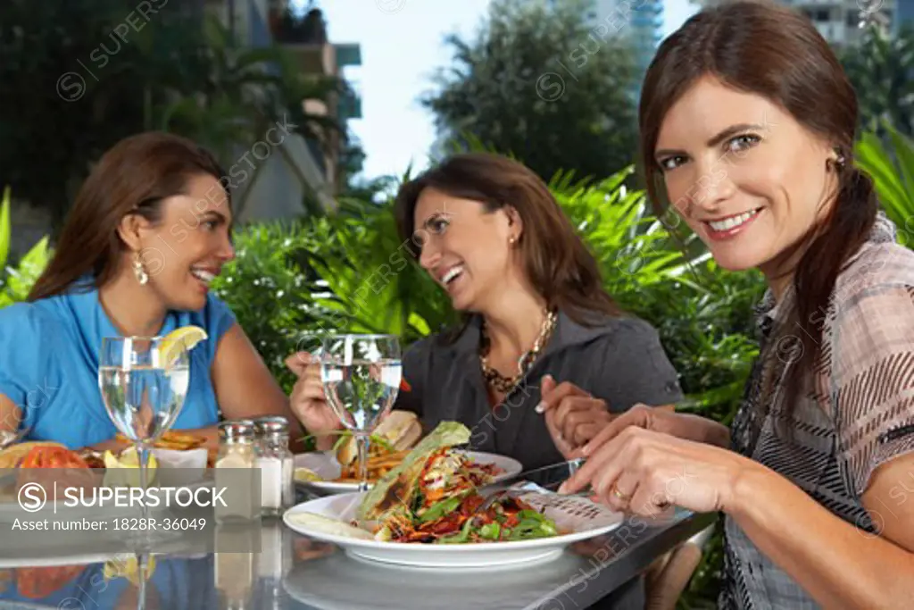 Women Eating in Restaurant   