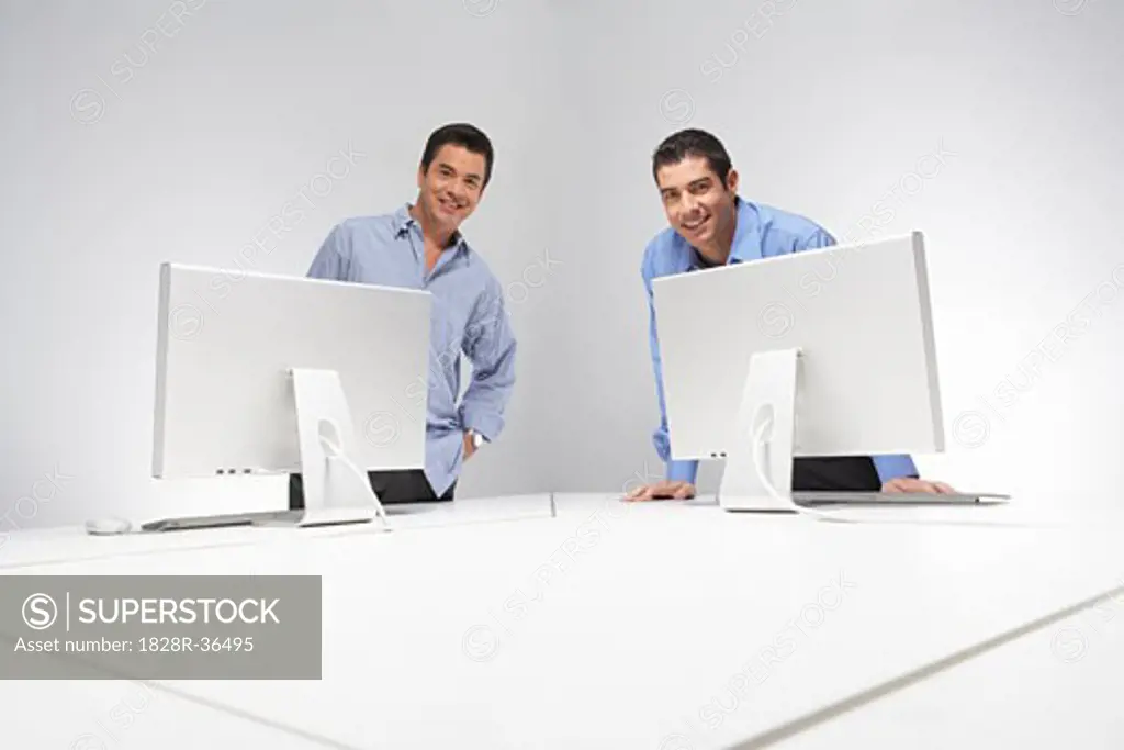 Portrait of Business Men with Computers   