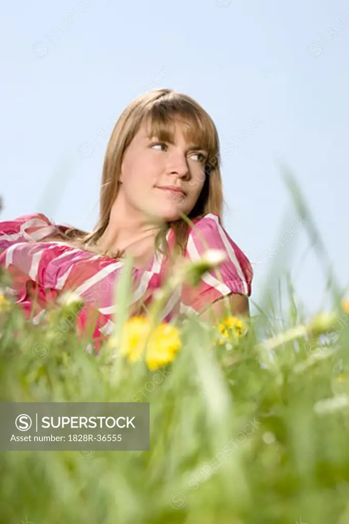 Woman Lying Down in Meadow   