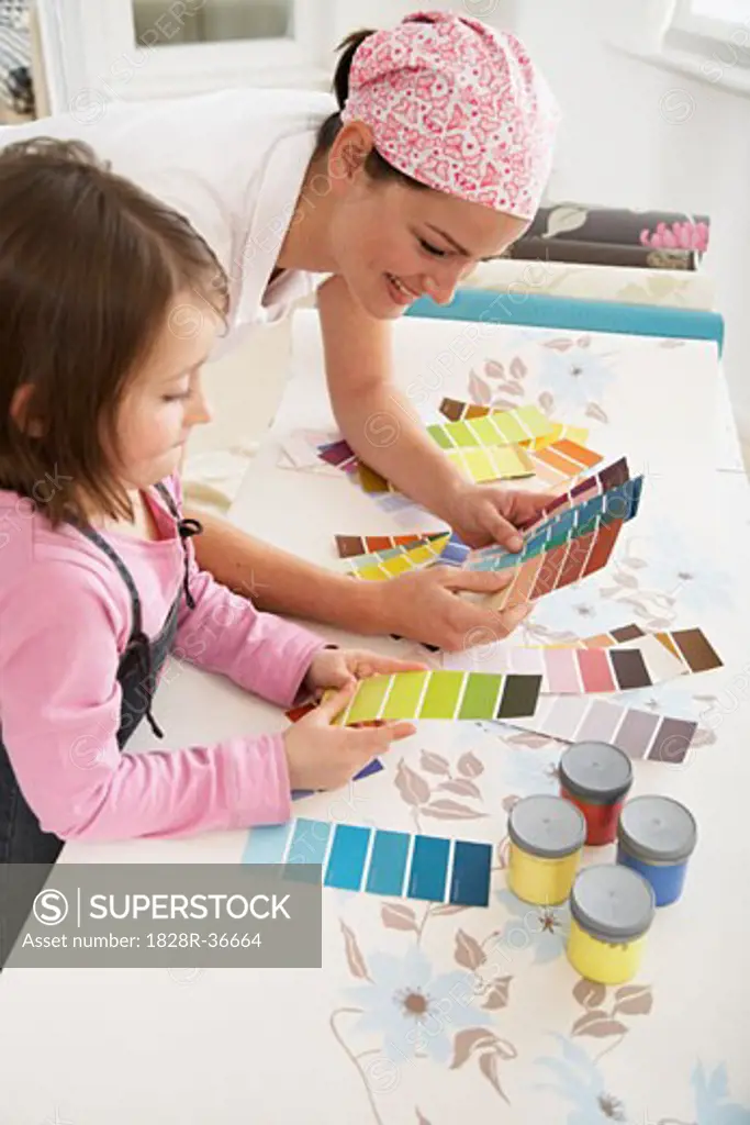 Mother and Daughter Looking at Paint Swatches   