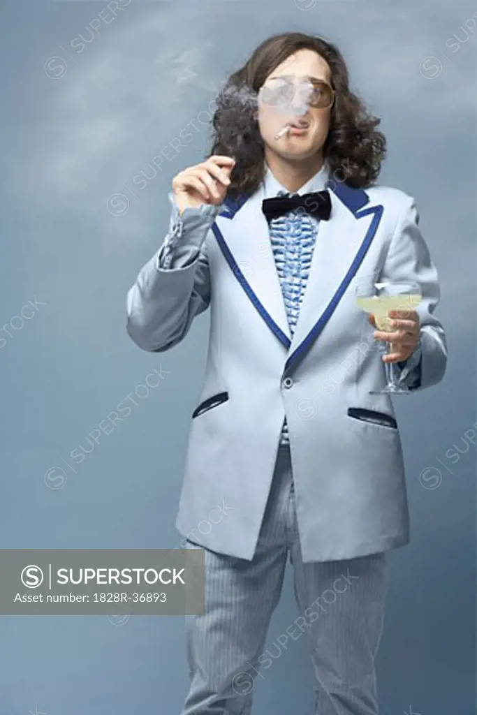 Portrait of Man Smoking, Holding Beverage   