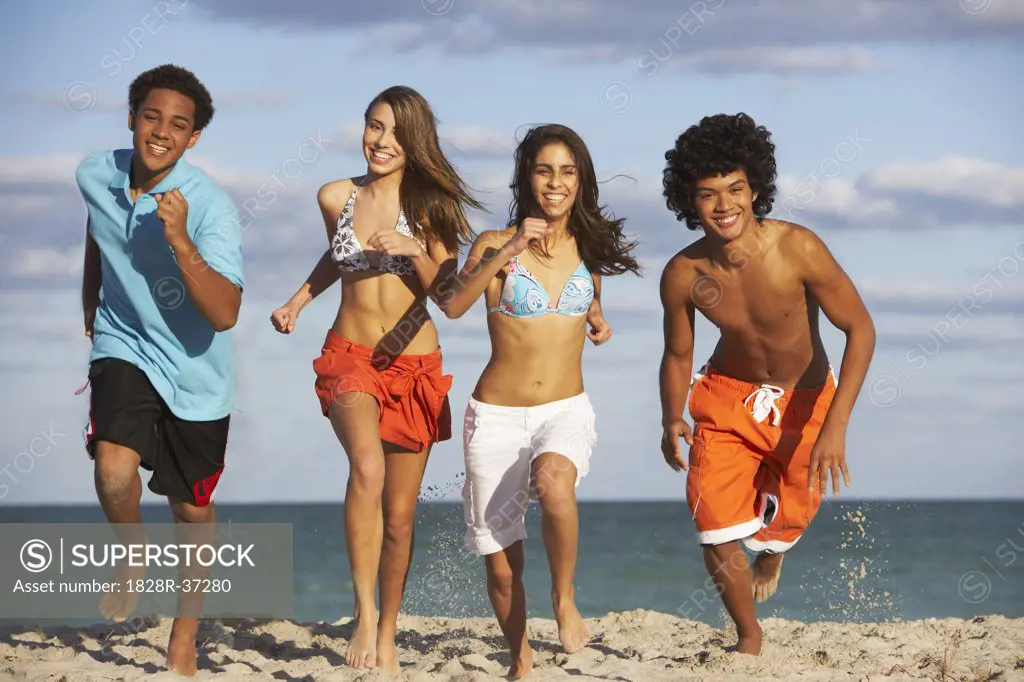 Friends Running on Beach   