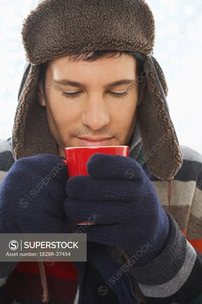 Man Drinking Hot Chocolate   