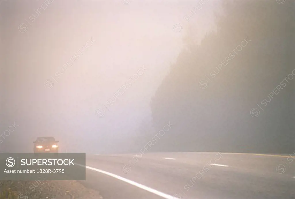 No Proeperty Release Car on Road in Fog   