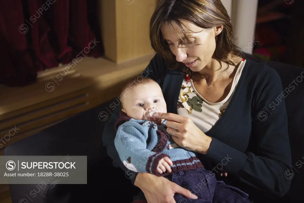 Woman Holding Baby   