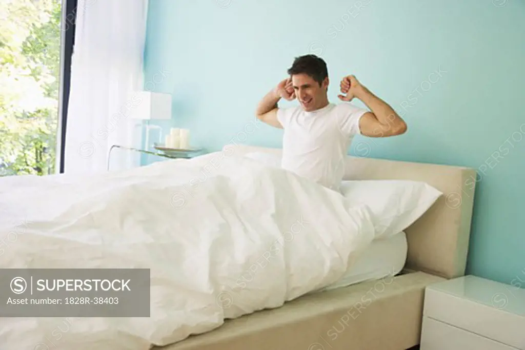 Man Waking Up in Bed   