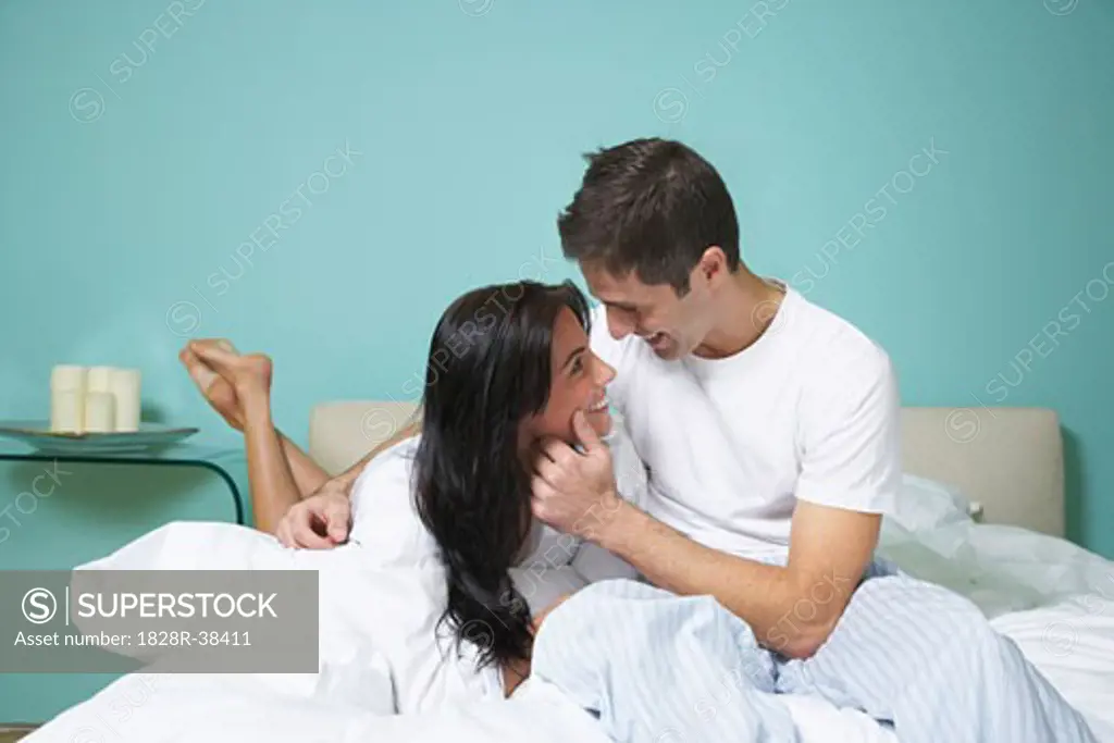 Portrait of Couple on Bed   