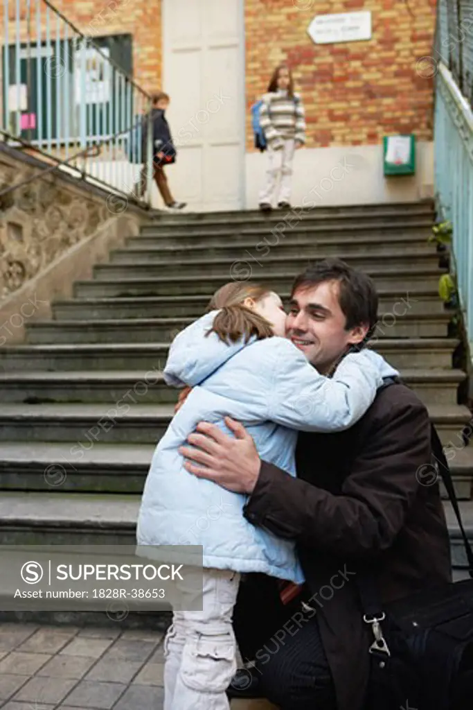 Father Dropping Daughter Off at School, Paris, France   