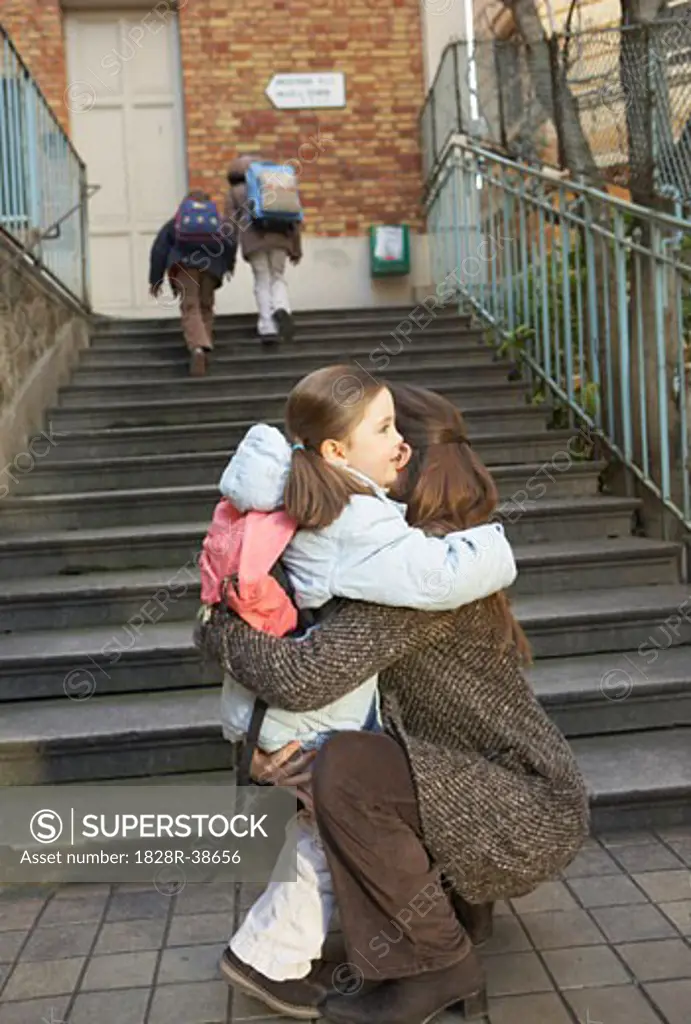 Mother Dropping Daughter Off at School, Paris, France   