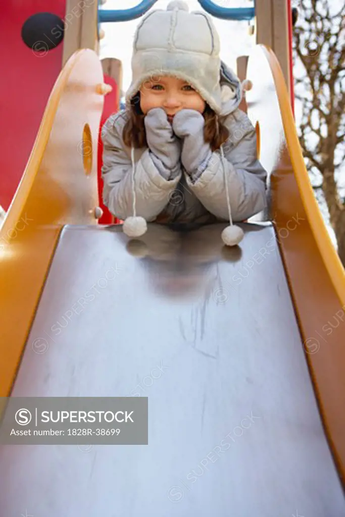 Little Girl on the Slide at the Playground, Paris, France   