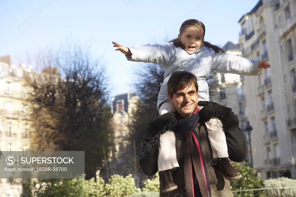 Daughter Riding on Father's Shoulders, Paris, France   