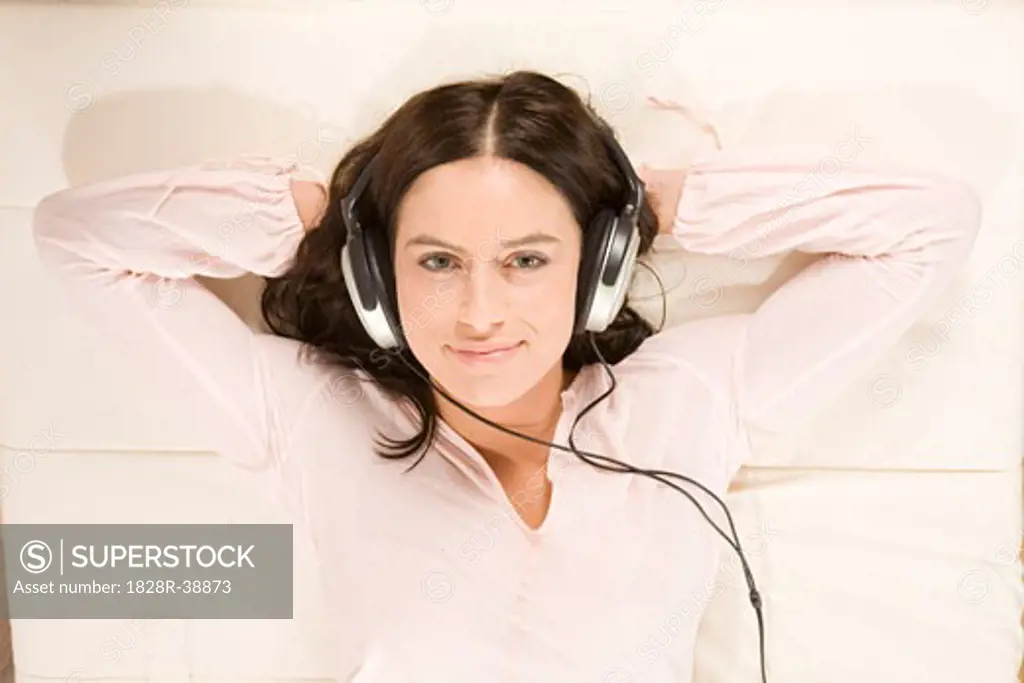 Woman Listening to Music with Headphones   