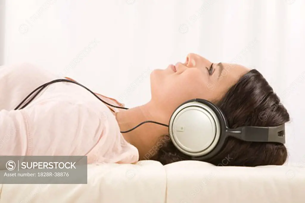 Woman Listening to Music with Headphones   