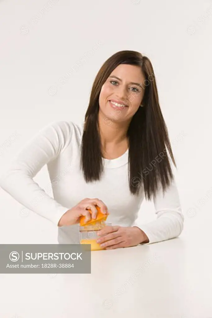Woman Squeezing Orange Juice   