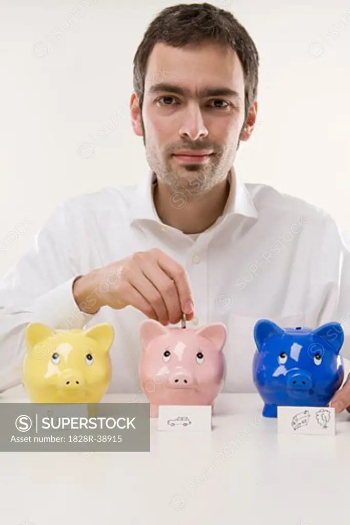 Man with Piggy Banks   