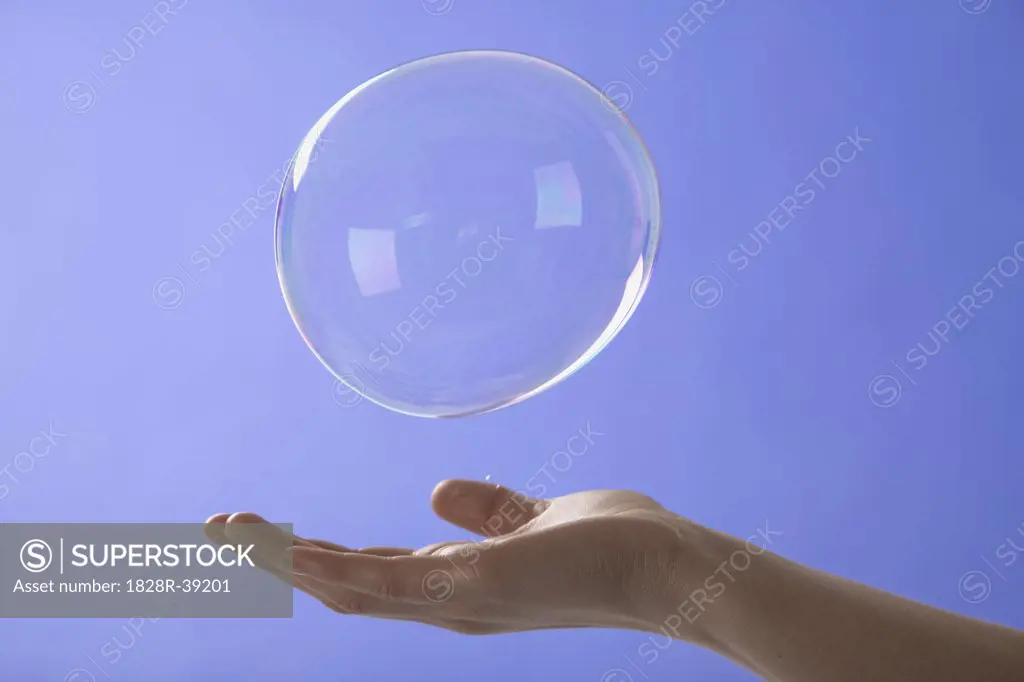 Woman Reaching for Bubble   