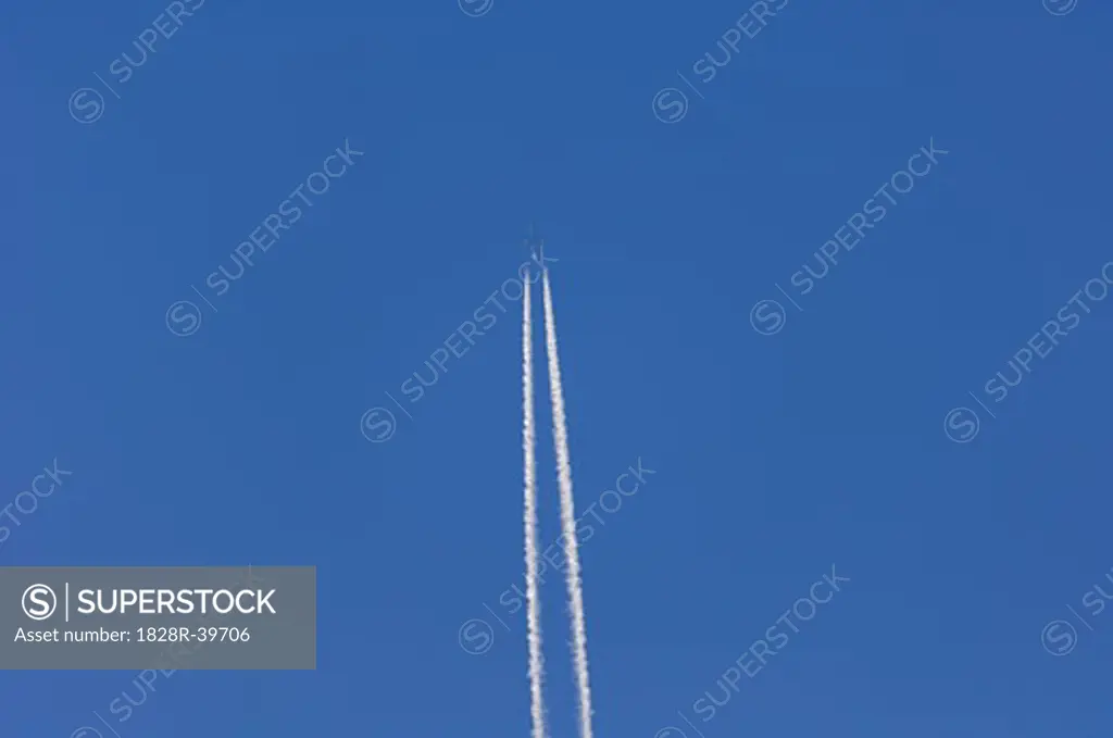 Jet Contrail in Blue Sky   
