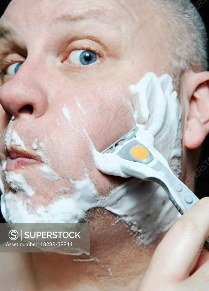 Man Shaving   