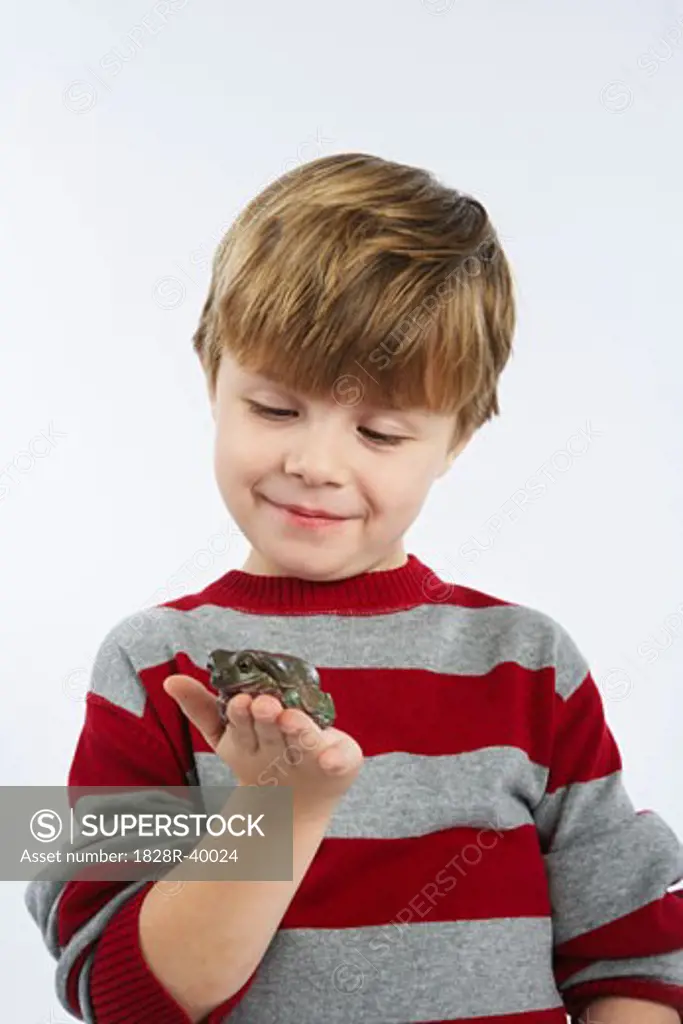Portrait of Boy Holding Frog   