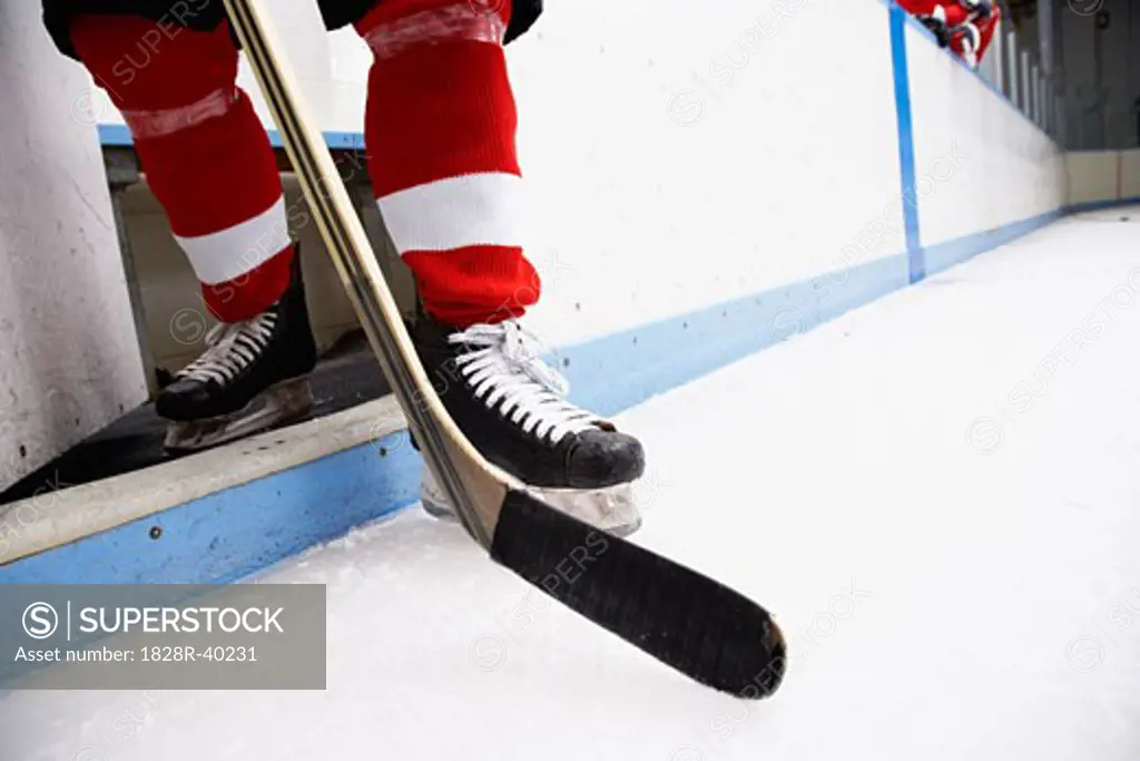 Close-up of Hockey Player's Skates and Stick   