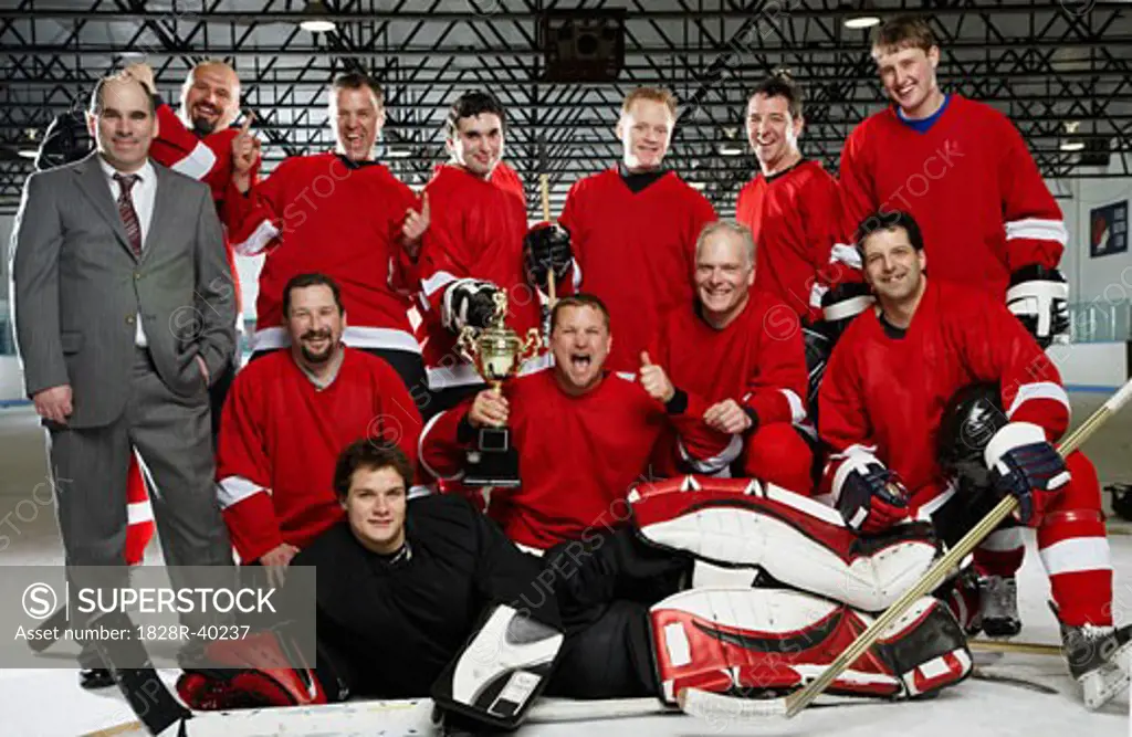 Portrait of Hockey Team With Trophy   