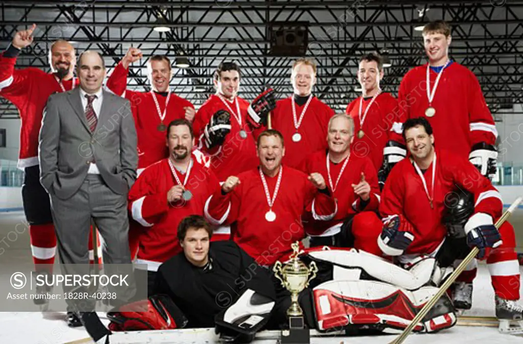 Portrait of Hockey Team With Trophy and Medals   