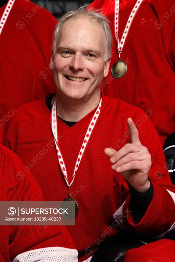 Portrait of Hockey Player Wearing Medal   