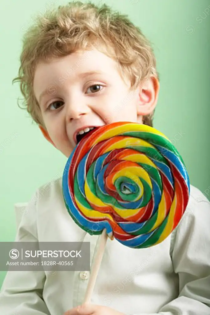 Boy Eating Lollipop   