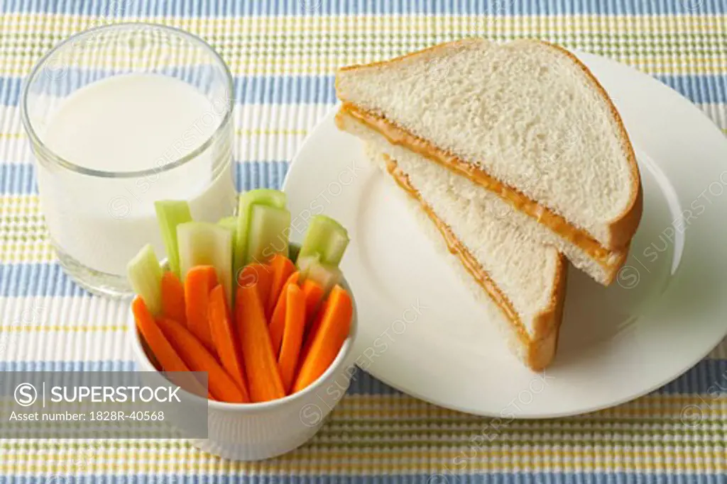 Soy Butter Sandwich, Glass of Milk, and Vegetables   