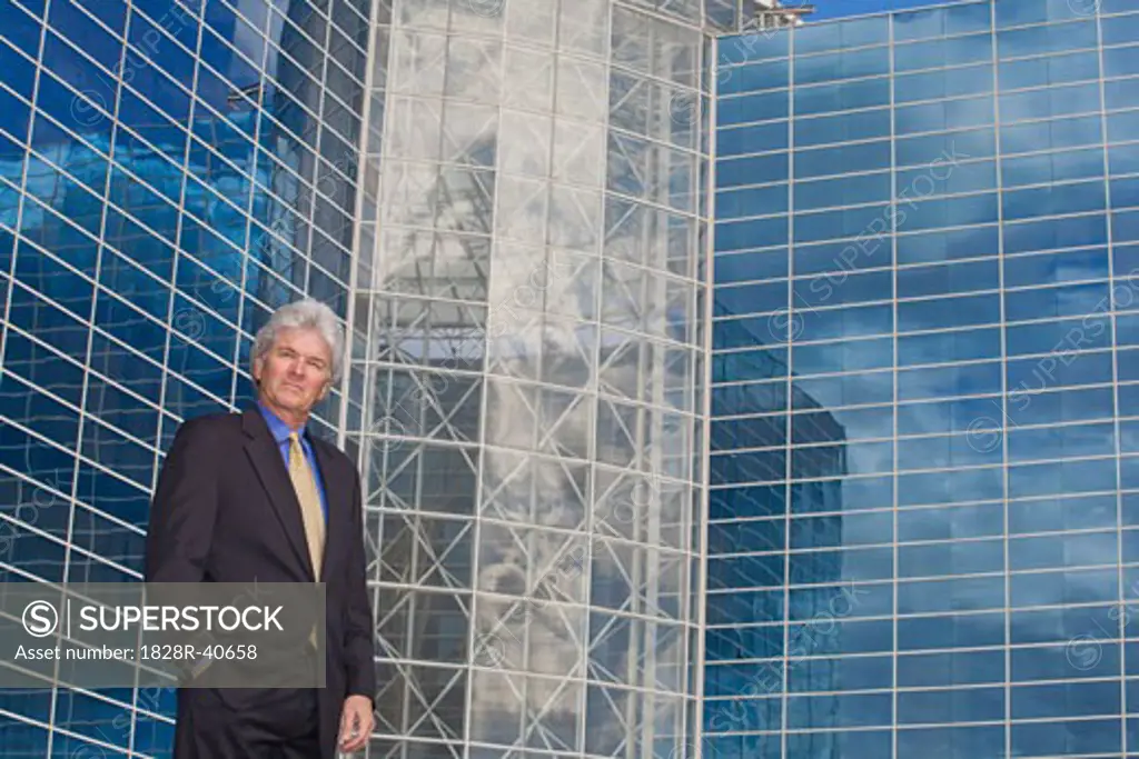 Portrait of Businessman in Front of Office Building   