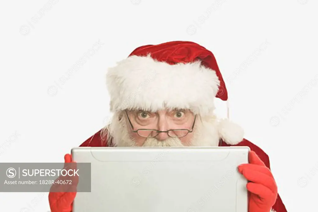 Santa Claus Using Laptop Computer   