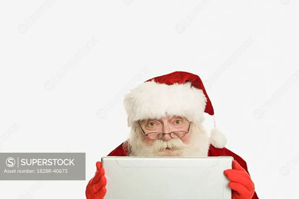 Santa Claus Using Laptop Computer   