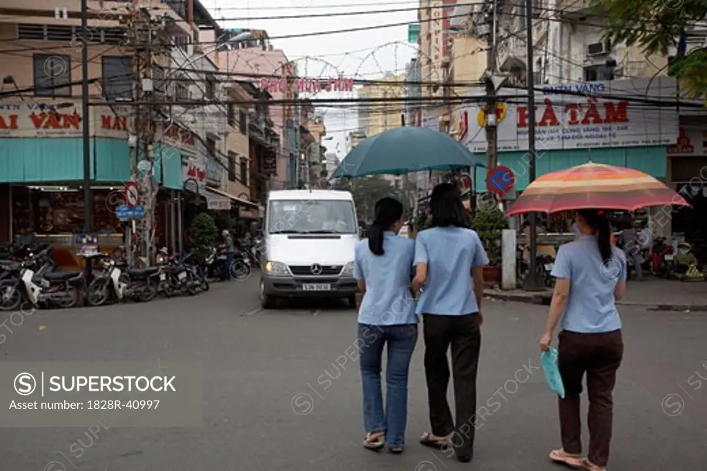 People Walking in City Street, Ho Chi Minh City, Vietnam   