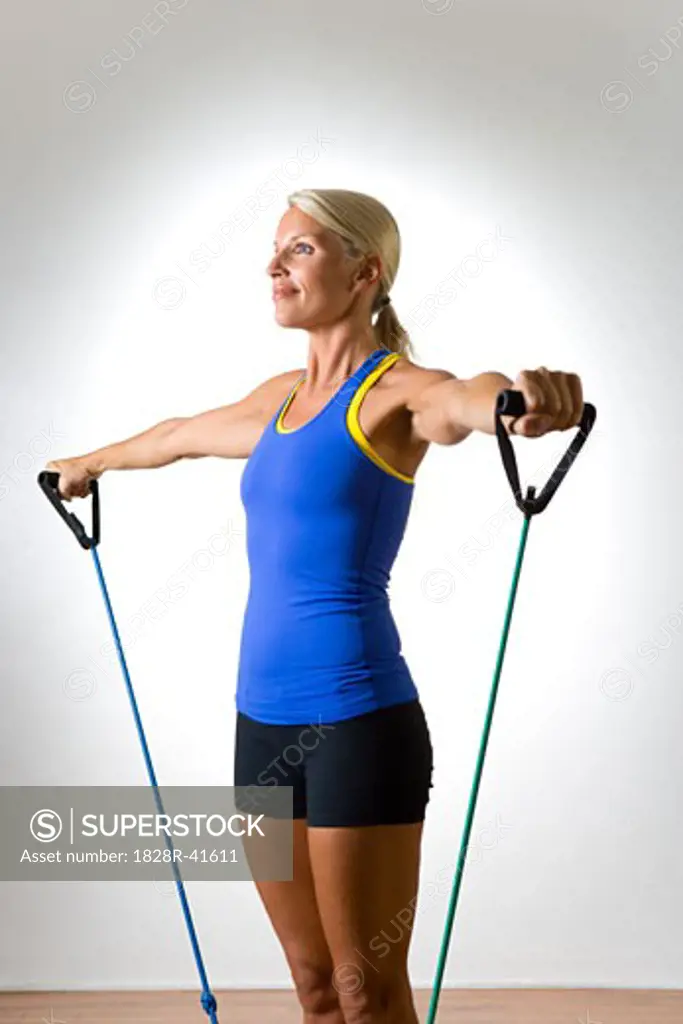 Woman Using Exercise Band   