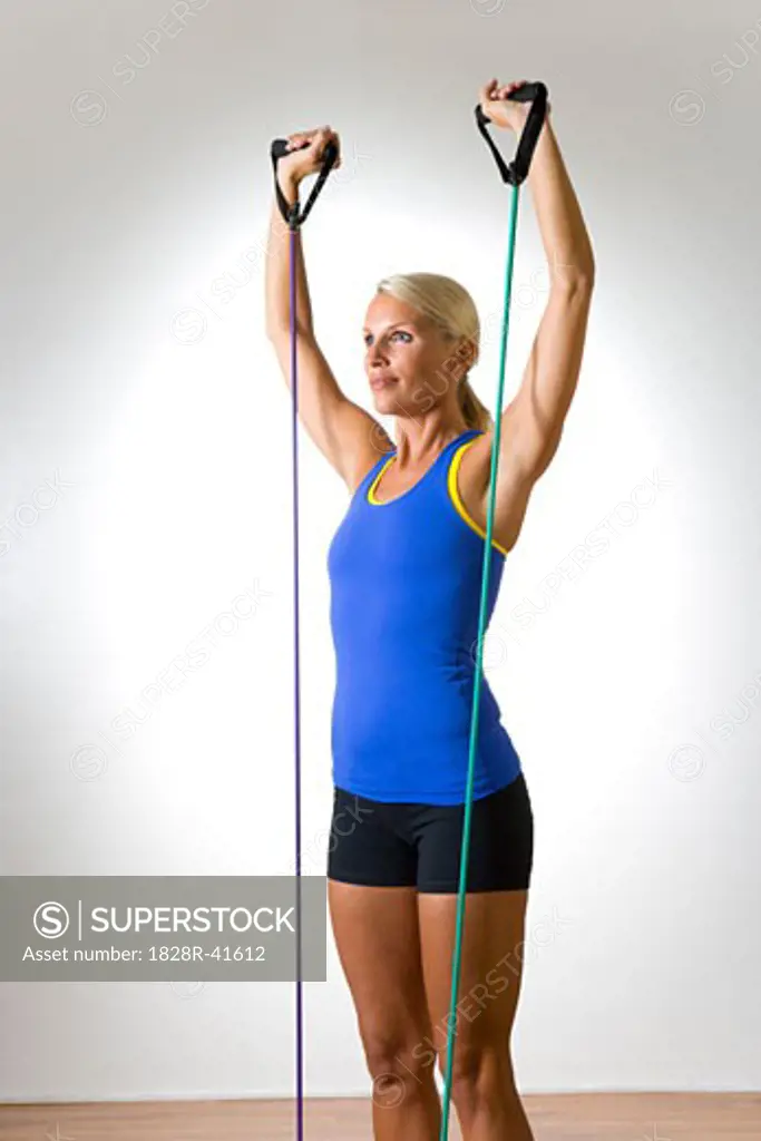 Woman Using Exercise Band   