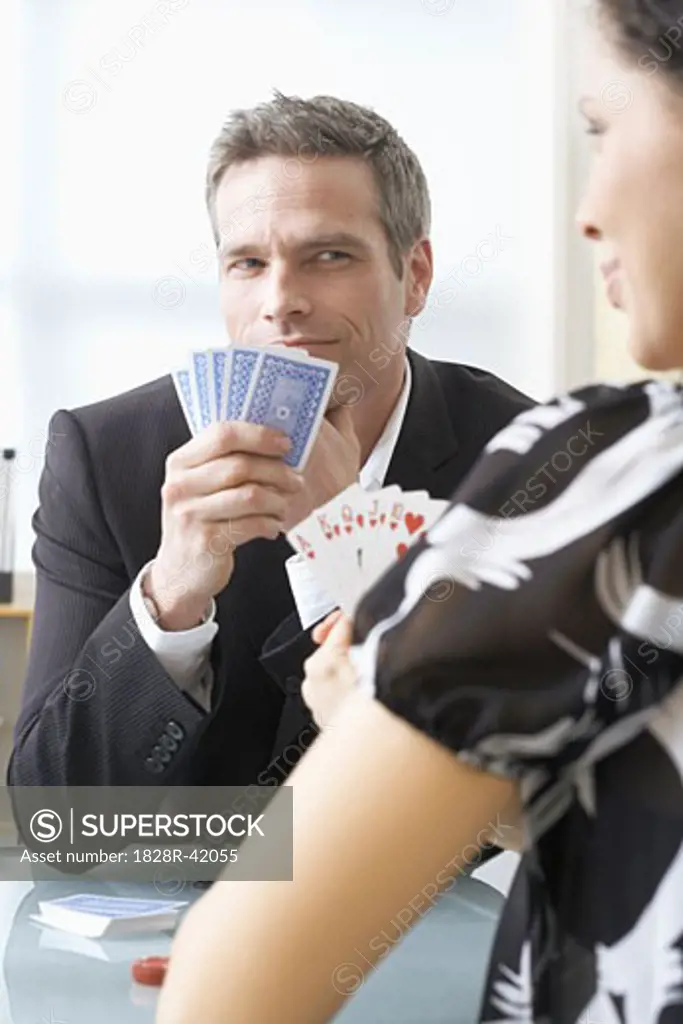 Business People Playing Poker   